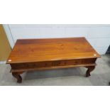 This is a Timed Online Auction on Bidspotter.co.uk, Click here to bid. A coffee table with two