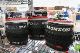 A WTB Bronson 29" 2.2 Tyre, a WTB Moto 2.1 26" Tyre and WTB Nano 29"