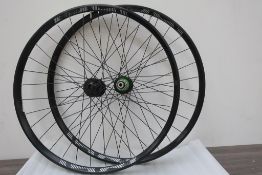 A Pair of New E Thirteen TRS+ ERD 561 Rims with Fitted Pro 4 148 Rear Hub and Hope Santa Cruz Pro 4