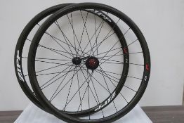 A Pair of Zipp 202 Firecrest Carbon Clincher Rims - The Rear fitted with II SPD P031214 Hub. Quick R