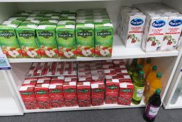 Three Shelves of Cartons/Bottles of Soft Drinks together with a Quantity of Crisps