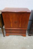 A reproduction Yew Wood Television & Video Cabinet