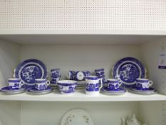 Shelf containing a Tuscan China Willow Patterned Tea Service