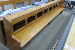 An over eleven foot long Mahogany Church Pew