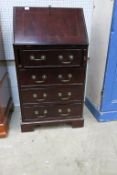 A reproduction Mahogany Bureau