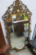 A heavy Brass framed Hall Mirror (a/f)