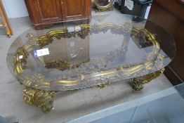 A very ornate gilt & plate glass Table