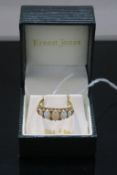 An 18ct Gold Opal Dress Ring