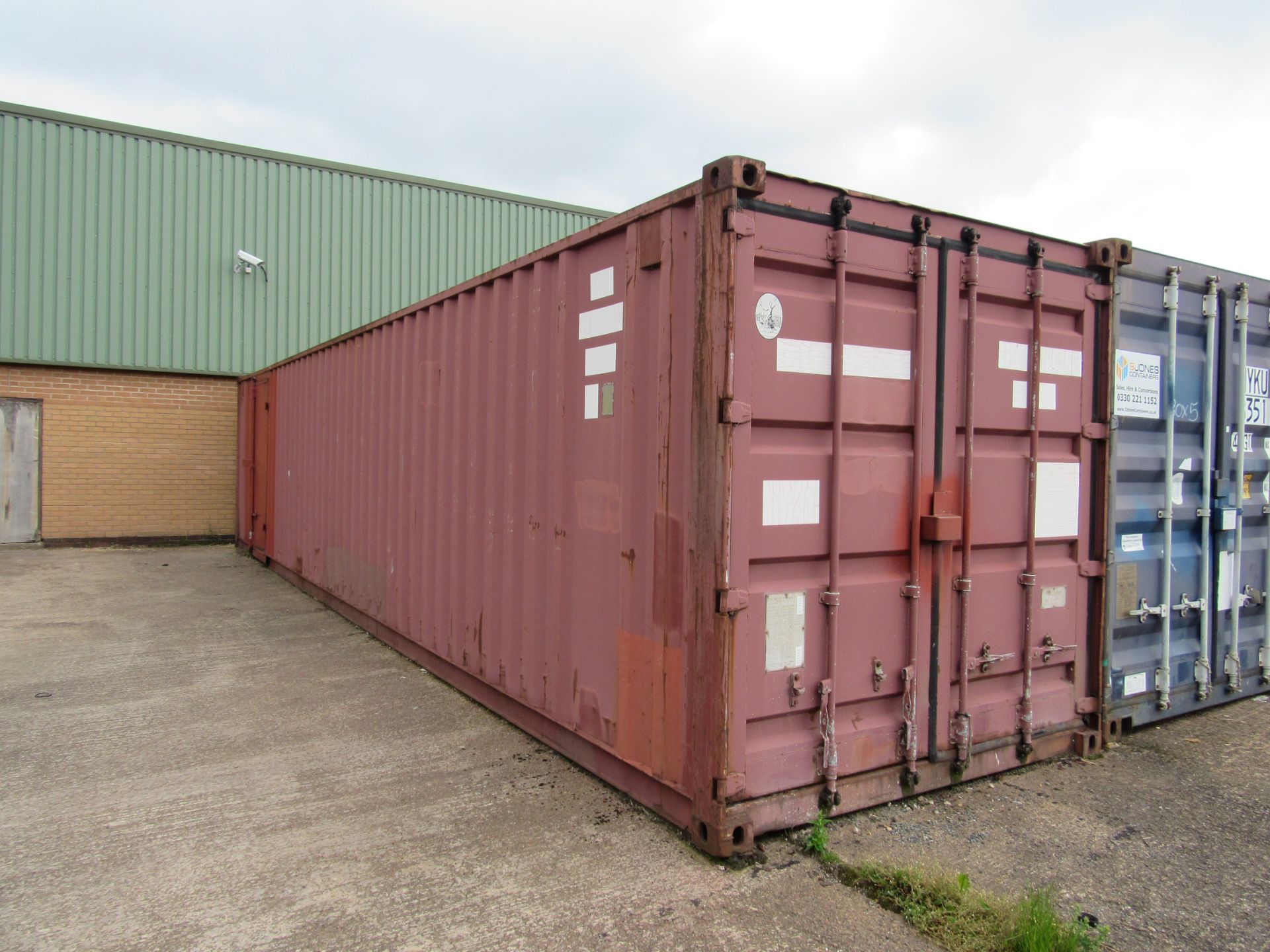 40ft Shipping Container with additional Single Leaf Door, wired for lighting, including contents (