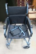 A "Days Healthcare" Model 338-S Folding Wheelchair