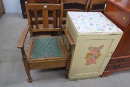 A cream painted Cupboard and Commode Armchair