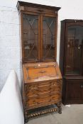 A Pre-War Oak Bureau Bookcase with glazed astragal