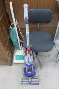 A Dyson DC 24 Vacuum Cleaner, a Hoover Upright Vac