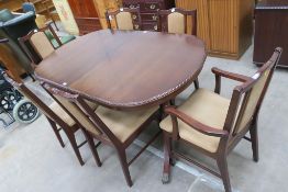 A 1993 dated Reproduction Mahogany Dining Suite to