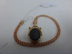A 9ct Gold Chain with swivel pendant