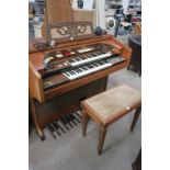 This is a Timed Online Auction on Bidspotter.co.uk, Click here to bid. A Farfisa walnut Cased