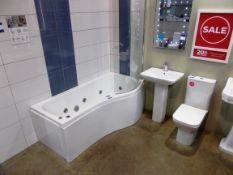 Scene bathroom suite including whirlpool right hand bath, sink and toilet. RRP £1,600