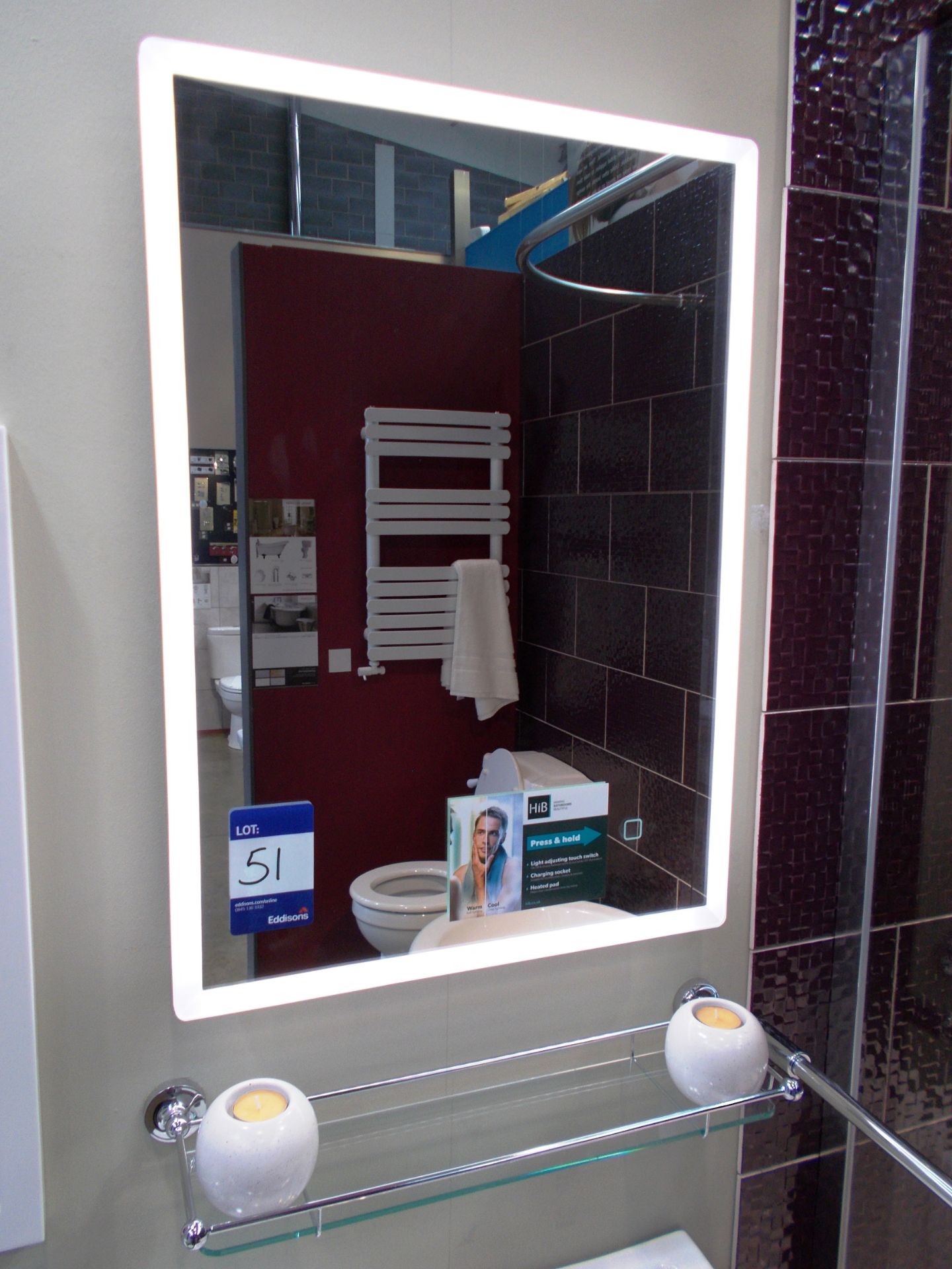 Illuminated wall mounted mirror. RRP £400