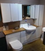 Portfolio bathroom furniture suite, including cabinets, mirror, sink, and toilet. RRP £2,000