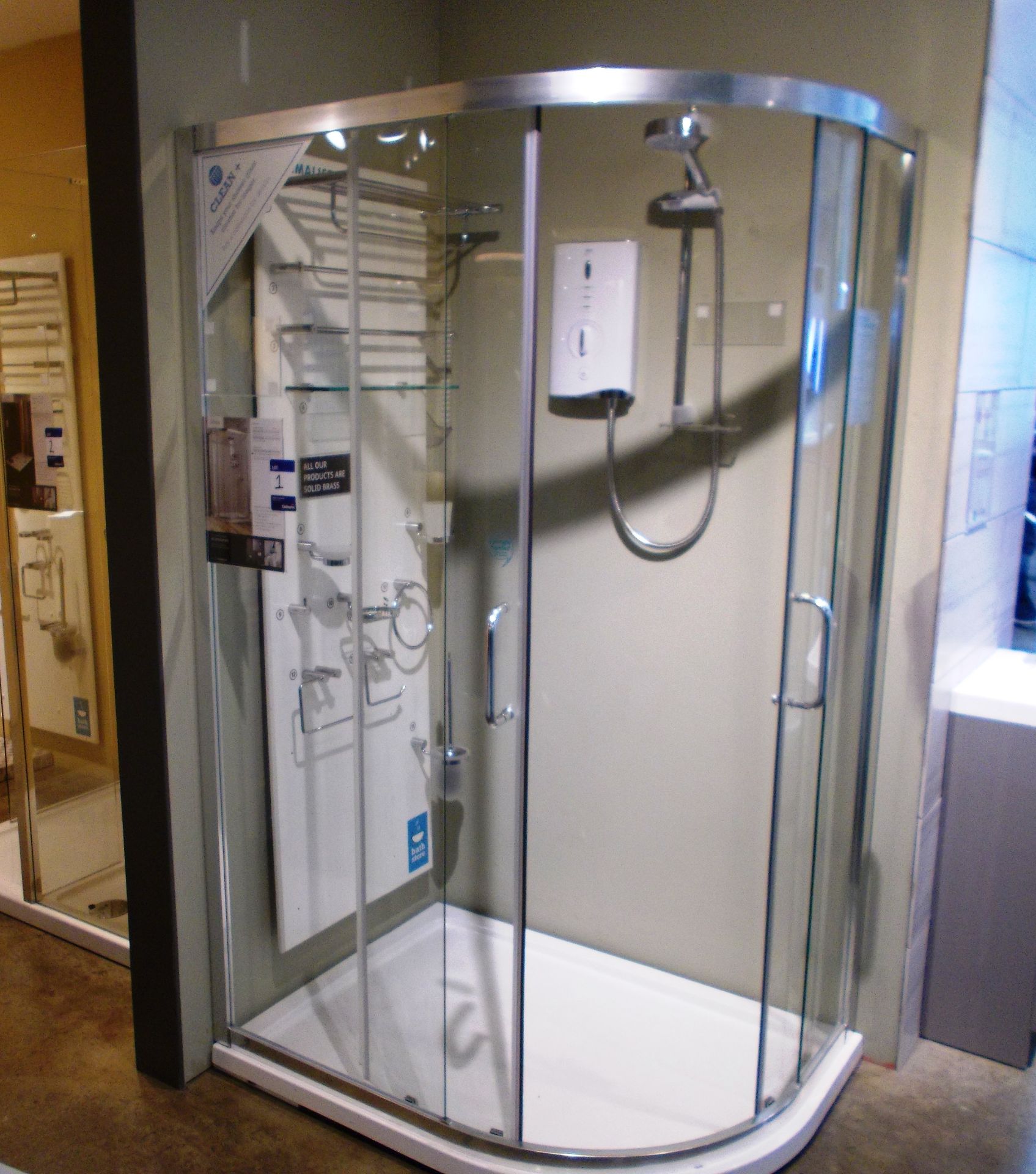 Atlas Quad, dual sliding door shower cubicle, with 1200 x 900 offset quadrant, and Mira Sport