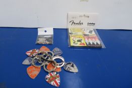 9 X Enamel Keyrings, 2 X Fender Fridge Magnets together with 6 X Guitar player chain