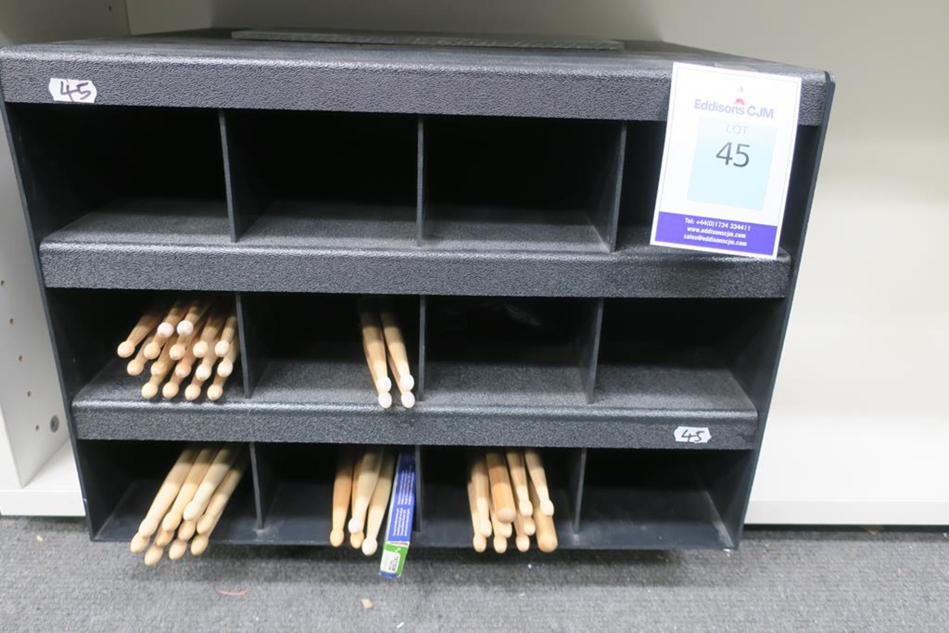 A quantity of Drum Sticks with Display