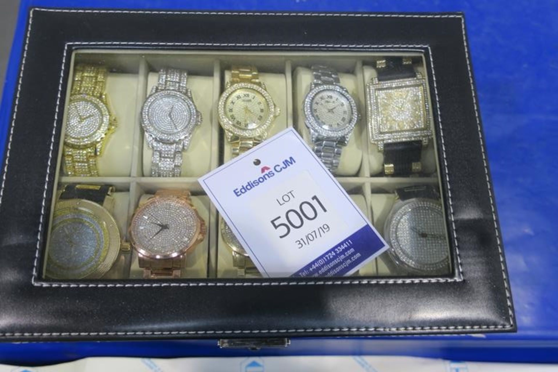A Black Leatherette Watch Case containing Twenty Wristwatches