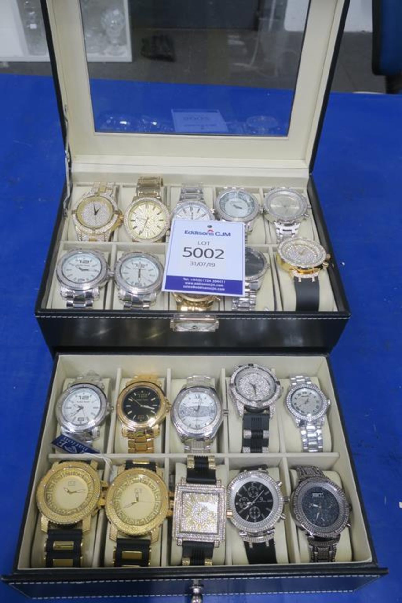 A Black Leatherette Watch Case containing Twenty Wristwatches