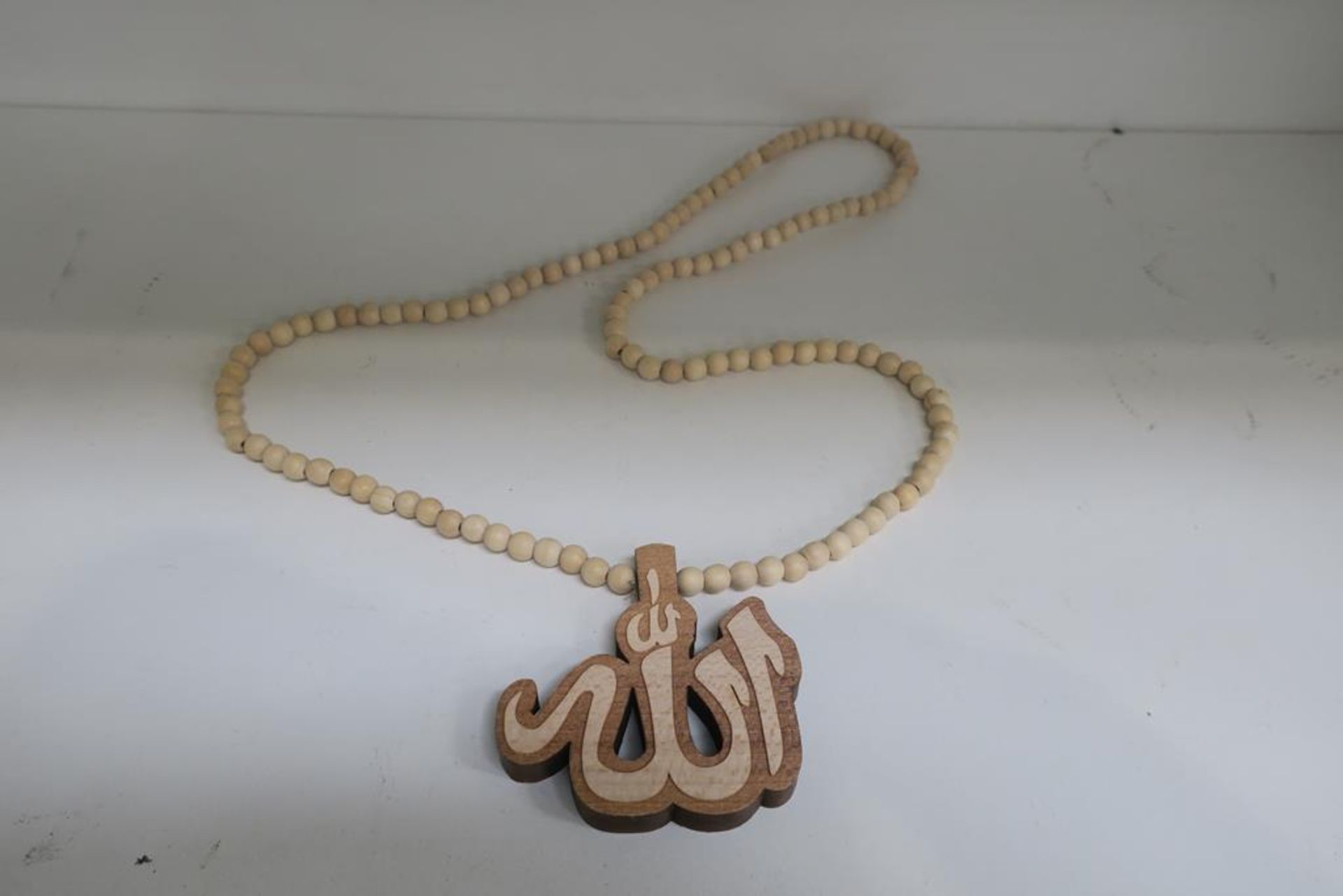 Three Boxes of Wooden Effect Necklaces with Pendants - Image 2 of 3