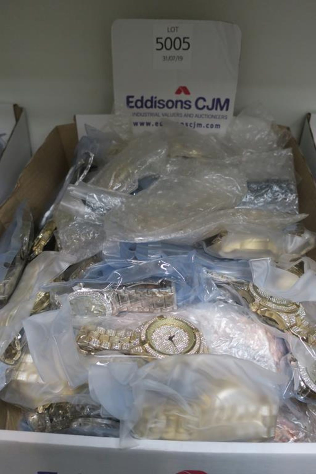 A Box containing over Ninety Wristwatches of assorted colours, sizes and styles