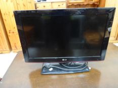 An LG Colour TV Model 26LD350 with stand