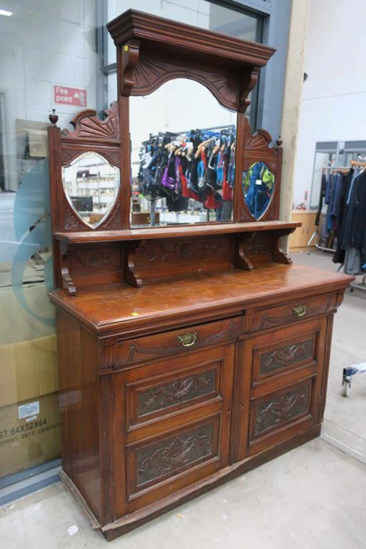 A Large Mahogany (?) Dresser with a Large Shaped M