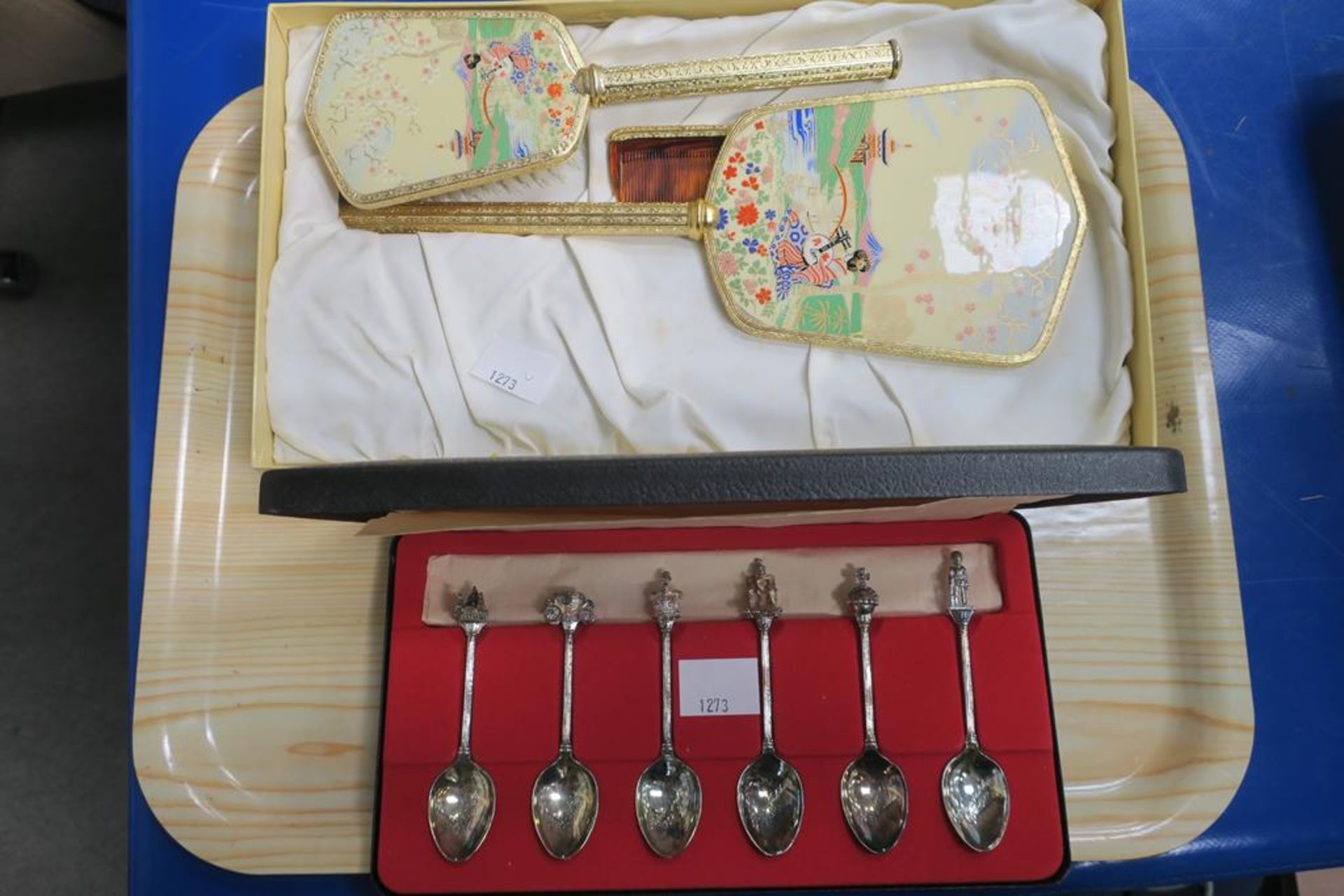 A Boxed Presentation Set of Teaspoons together wit