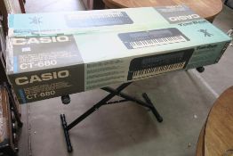 A Casio CT-680 ' Tone Bank' electronic Keyboard wi