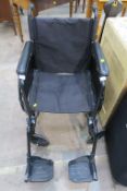 A 'Drive' black upholstered Folding Wheelchair