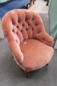A Pink Upholstered Nursing Chair