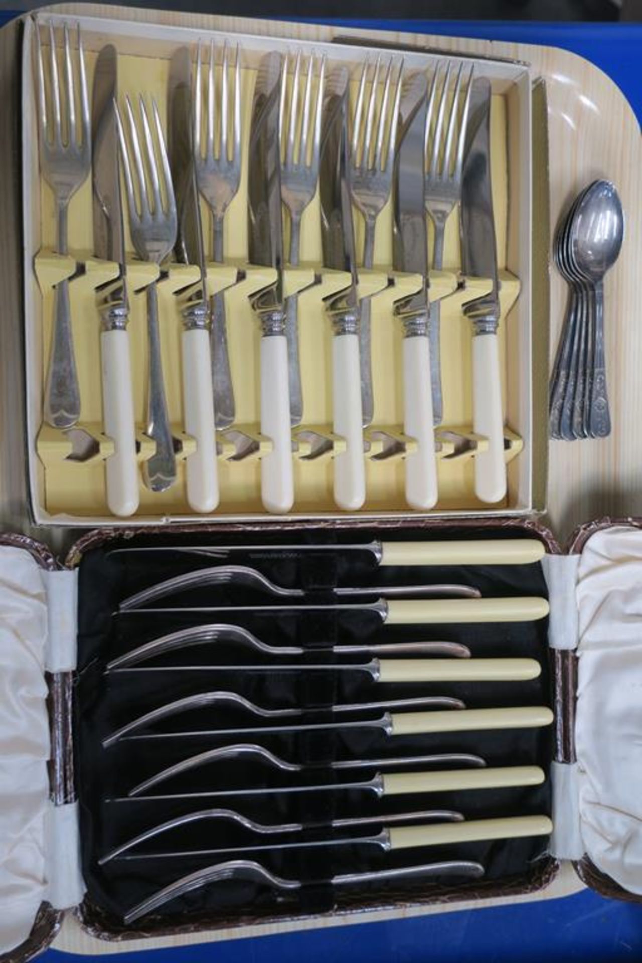 Two Boxed Sets of Knifes and Forks together with S