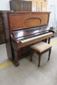 A Steinbach Berlin Walnut Cased Upright Piano