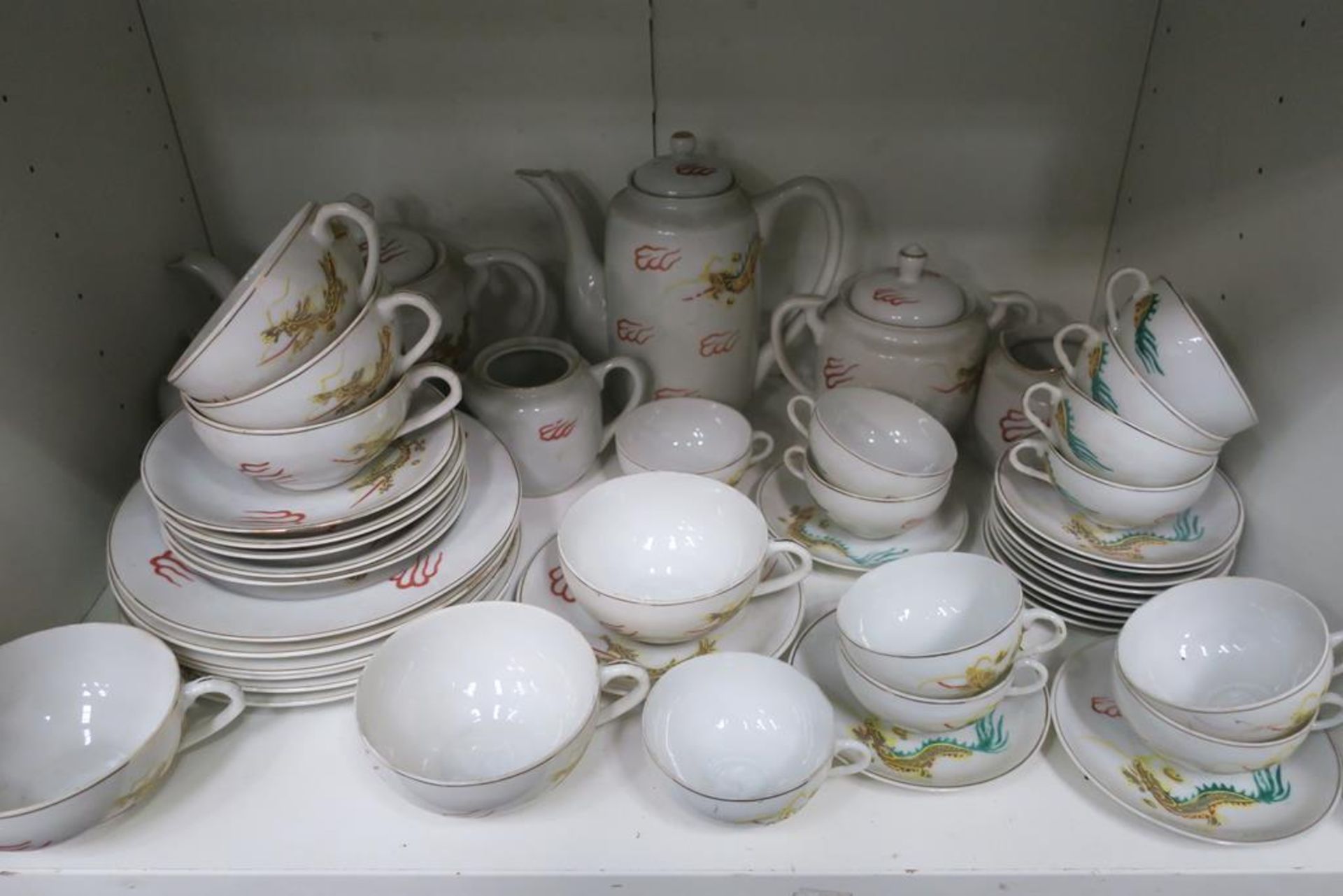 A Large Japanese Porcelain Tea Service