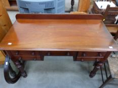 A Mahogany three Drawer Dressing Table/Desk