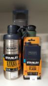 Four Stanley Flasks and a TiV Vacuum Flask 'Lifeventure 1000' (boxed). The Stanley Flasks include Tw