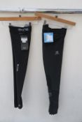 Pair of Salomon Mens Fast Wing Long Tights together with a Pair of Skins Mens DNAmic Force Thermal L