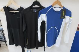 Black Salomon Mens Trail Runner Long Sleeve Tee together with a Black Craft Eaze Singlet and a Skins
