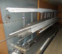 Rack and contents, to include assortment of aluminium trim, box section, and off cuts