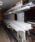 Rack and contents, to include assortment of aluminium trim, box section, and off cuts