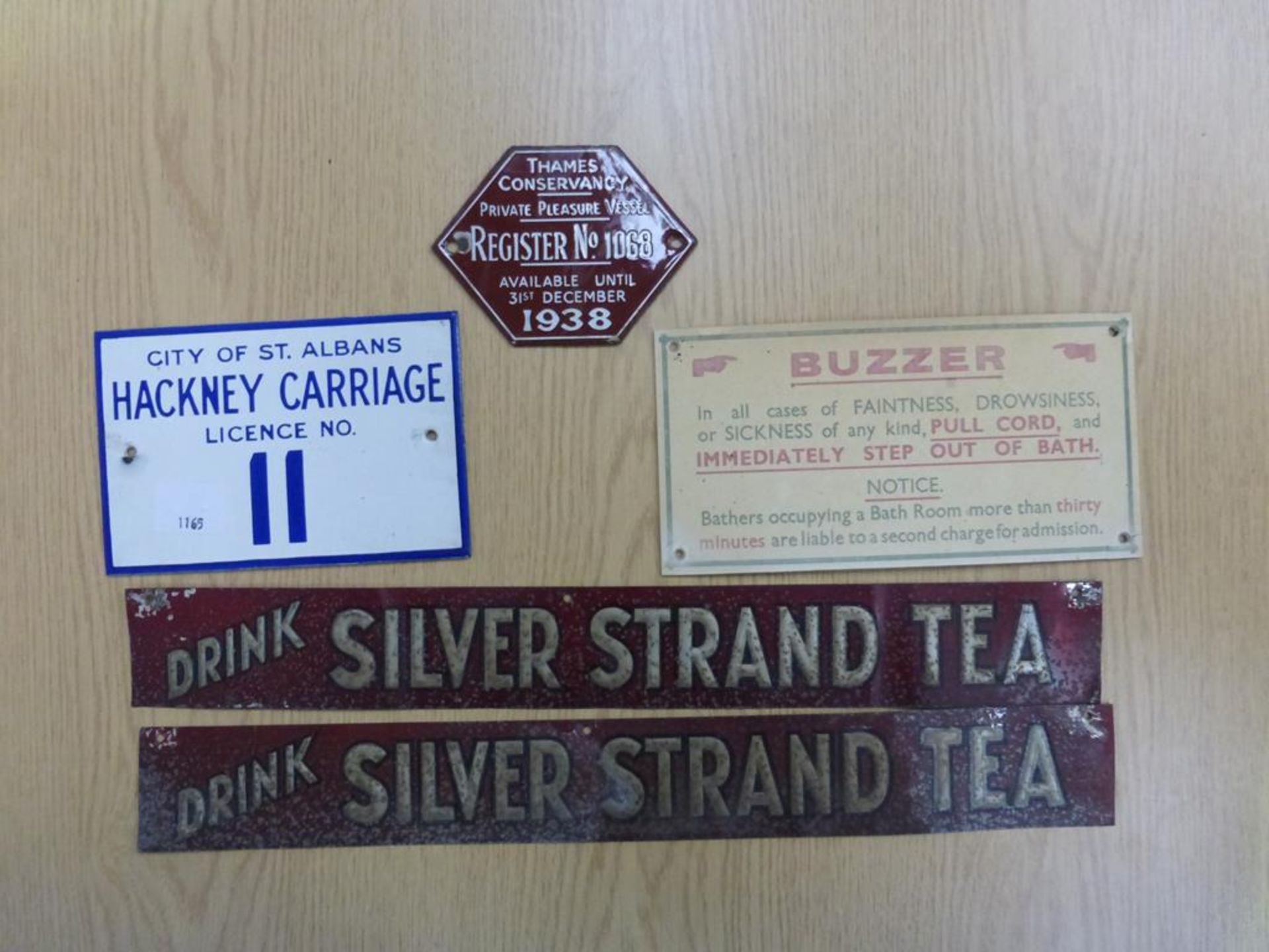 Four Metal Signs