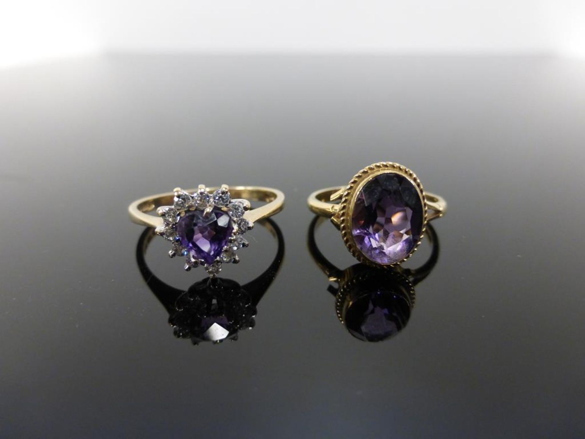 Two, 9CT Gold Amethyst Rings