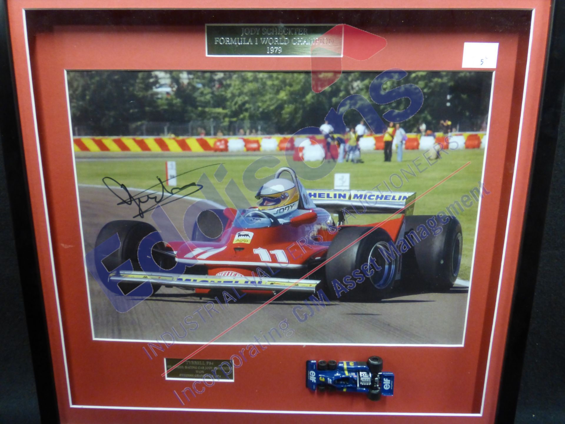 Sports Autographs: Jody Scheckter in a Tyrrell Formula 1 Racing Car