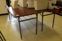 2 Rectangular Sapele Effect Fold Away Tables and Square Fold Away Table (Located Training Room)