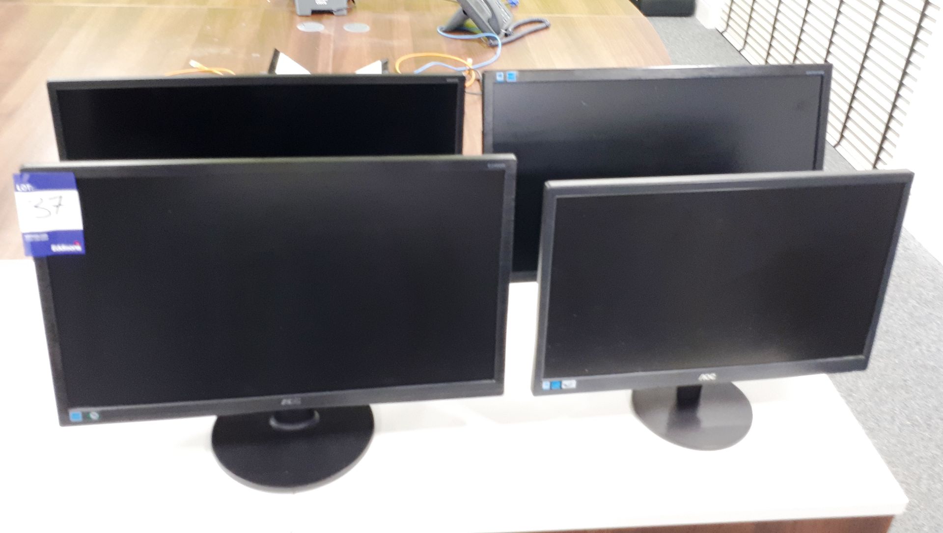 4 assorted monitors